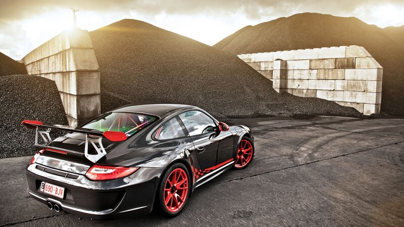 Black Porsche with red accents