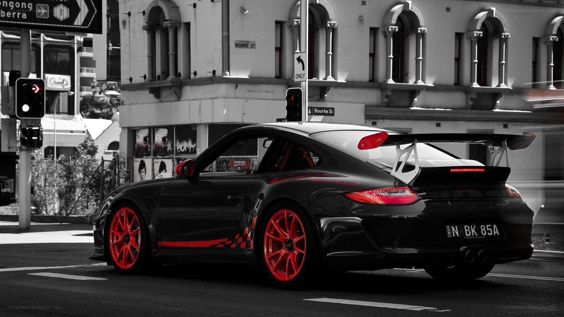 Black Porsche with red accents