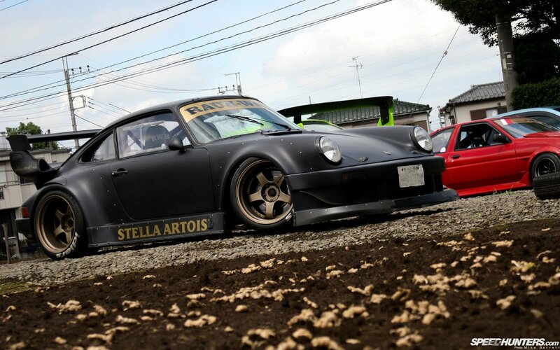 Black Porsche with Stella Artois livery