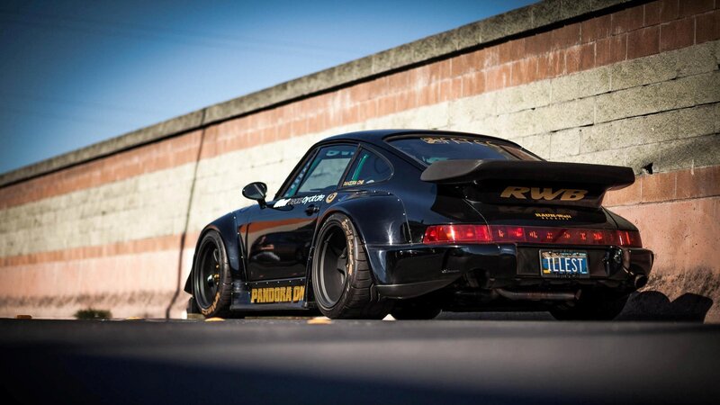 black porsche with widebody kit