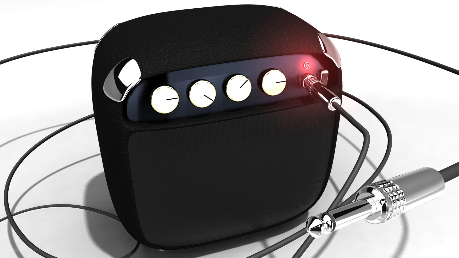 black portable speaker with cables