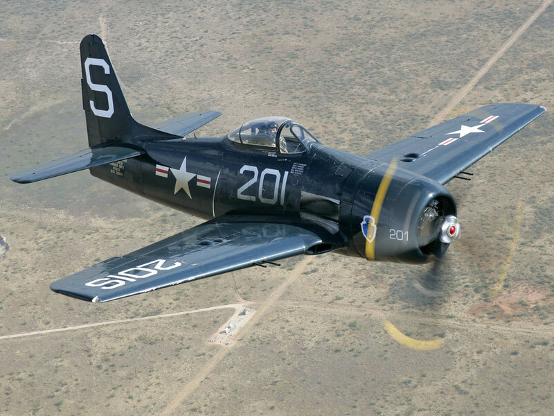 Black Propeller Plane — Aerial