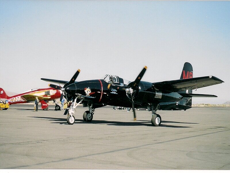Black Propeller Plane — Calm