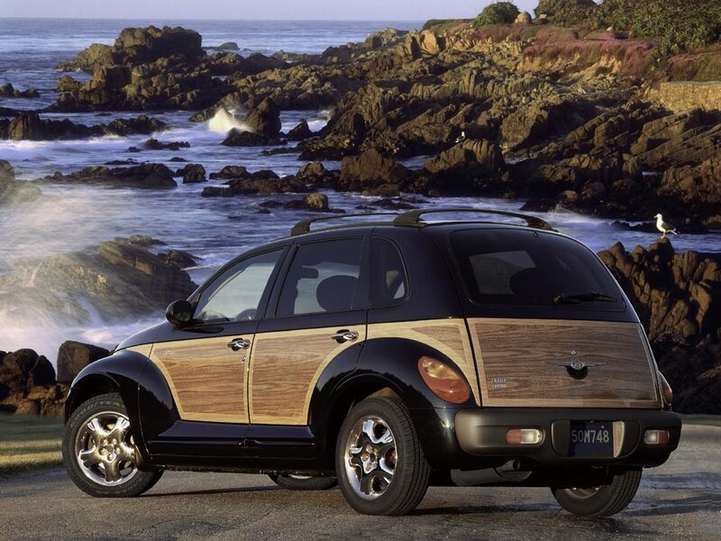 Black PT Cruiser by the coast