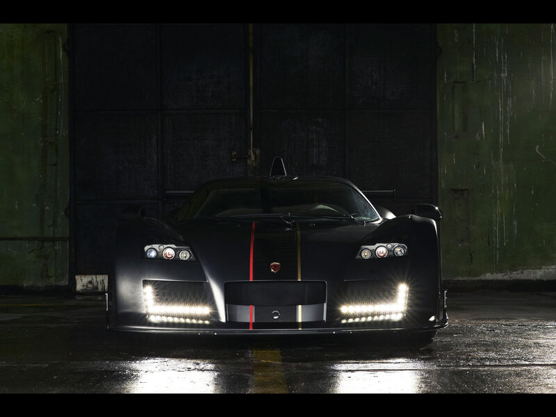 Black Race Car — Dramatic, Photograph, Garage
