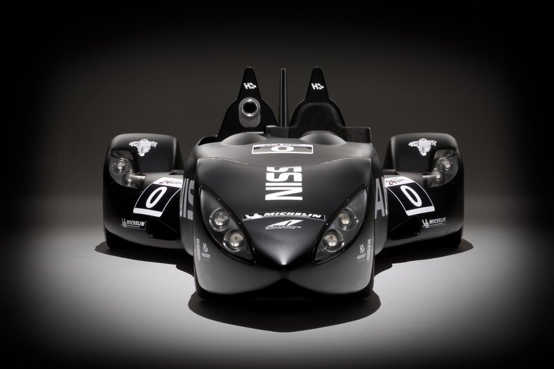 Black Race Car — Dramatic, Photograph, Lights, Sponsors