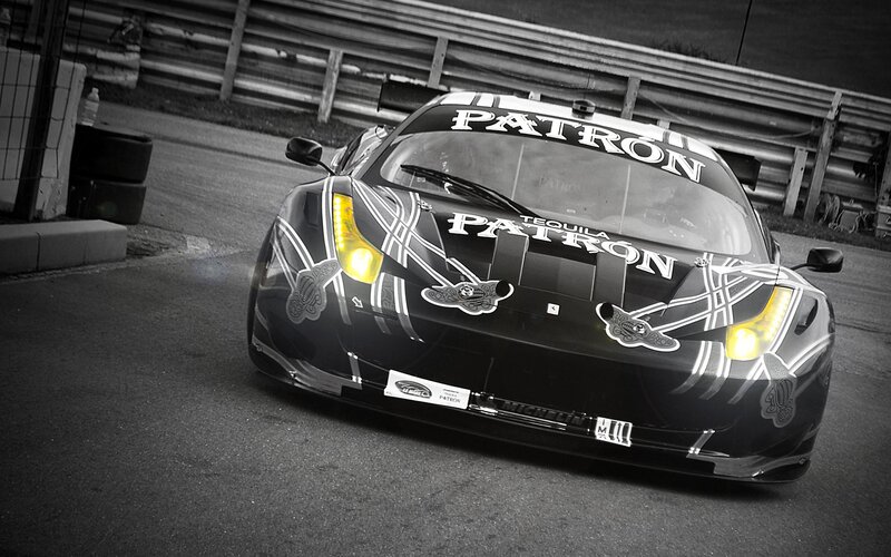 Black Race Car — Dramatic, Photograph, Race Track, Guardrail
