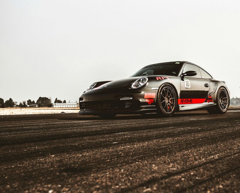 Black Race Car — Dramatic, Photograph, Race Track