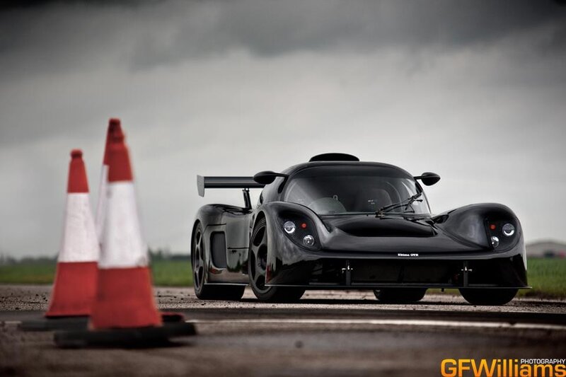 Black Race Car — Dramatic, Photograph, Traffic Cones, Wings