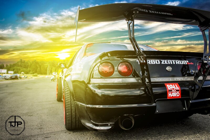 Black Race Car — Dramatic, Sunset, Photograph, Race Track