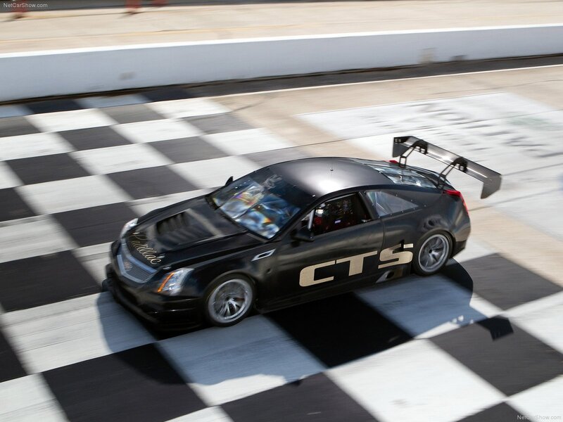 Black Race Car — Dynamic, Afternoon, Photograph, Race Track, Checkered Flag, Wing