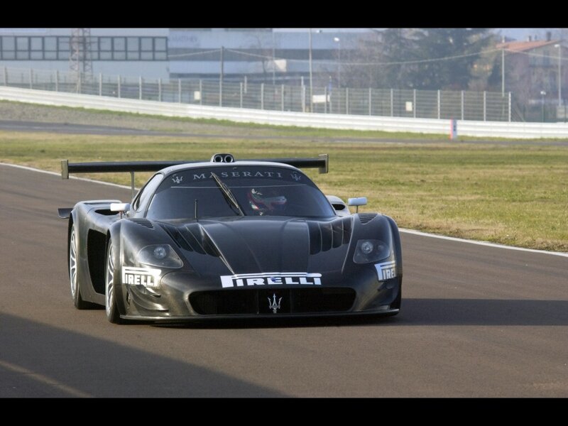 Black Race Car — Dynamic, Afternoon, Photograph, Race Track, Driver, Grass
