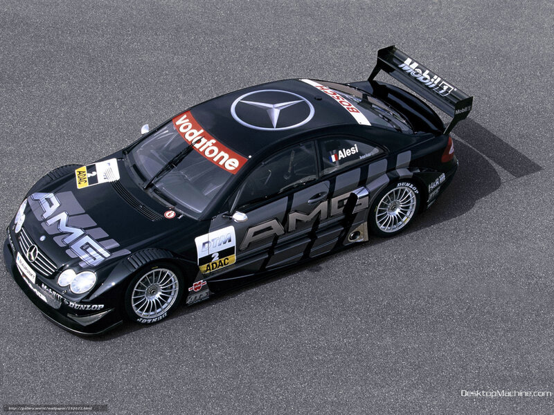 Black Race Car — Dynamic, Afternoon, Photograph, Vodafone