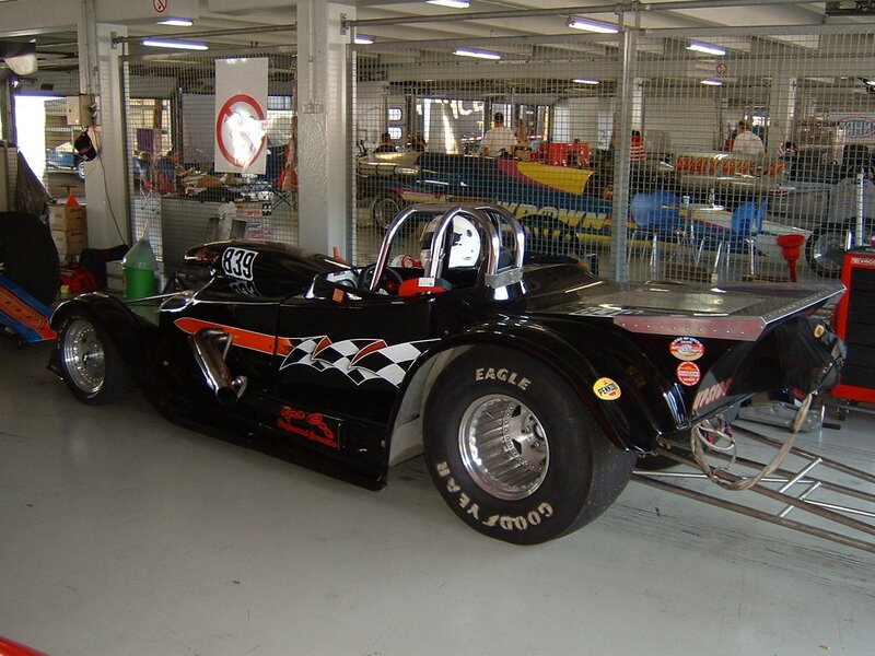 black race car in garage