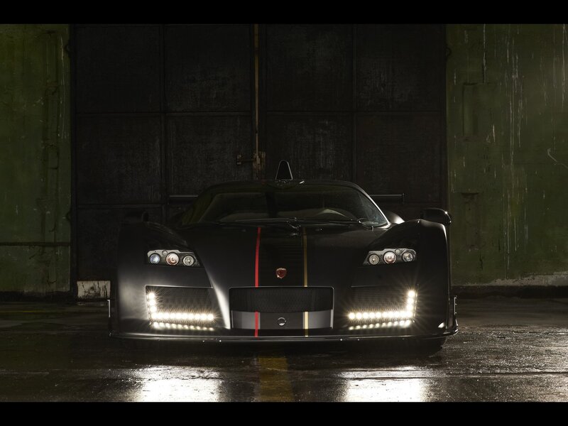 Black race car in garage