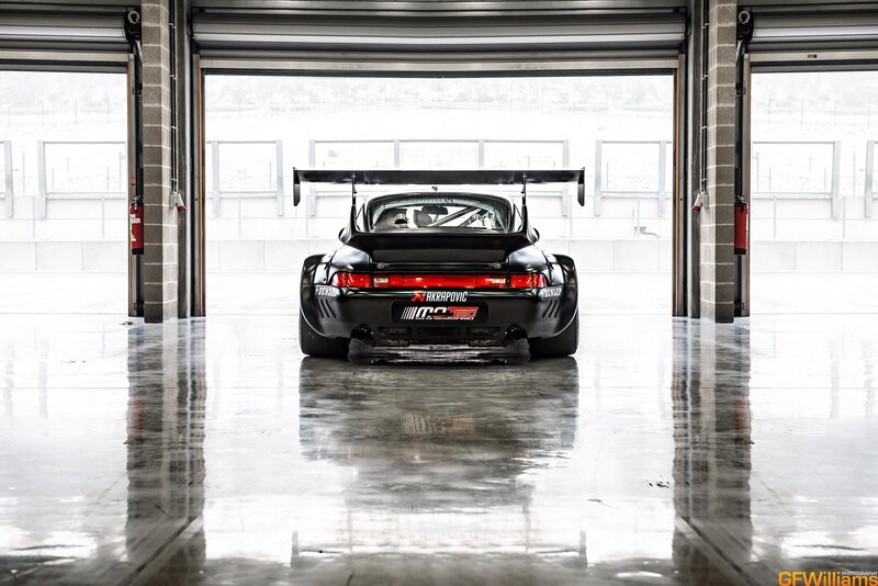 black race car in garage