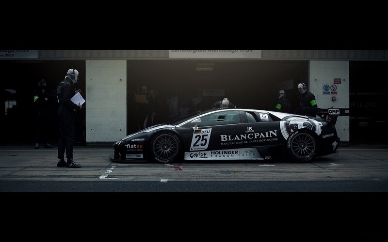 Black Race Car in Garage — Dramatic
