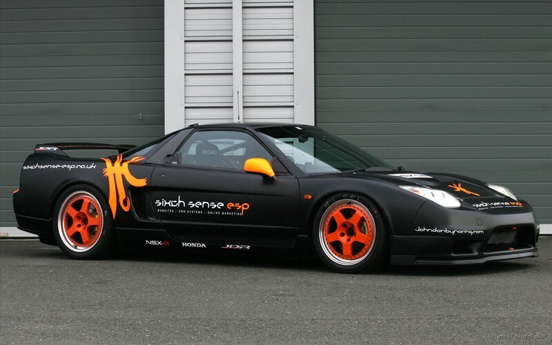 Black Race Car — Neutral, Photograph, Orange Wheels
