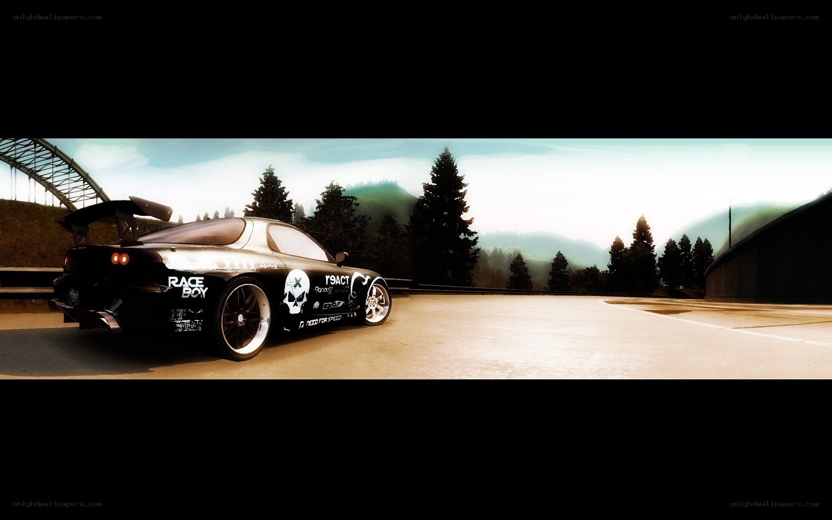black race car on a road