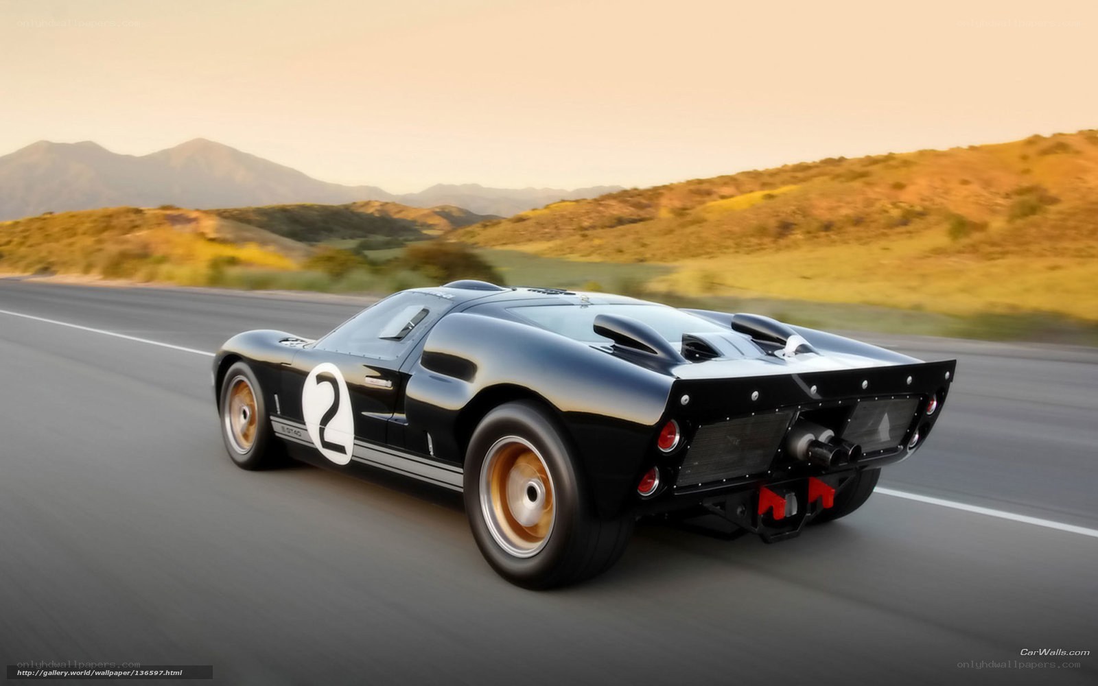 Black race car on a road