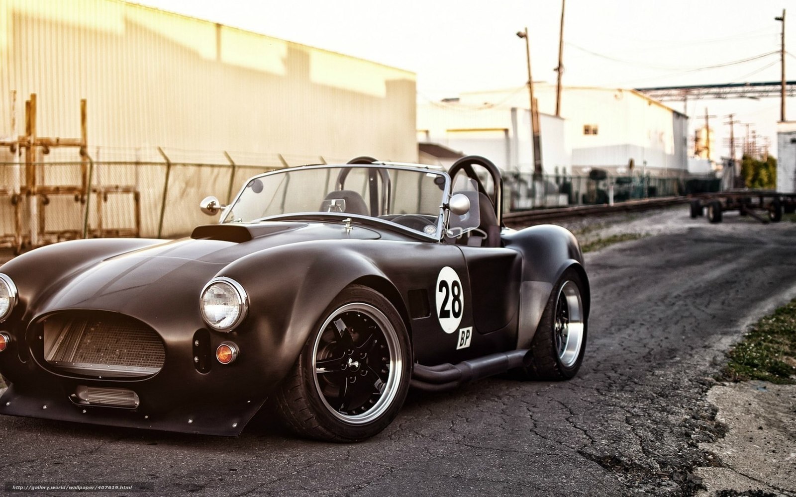 Black race car on asphalt