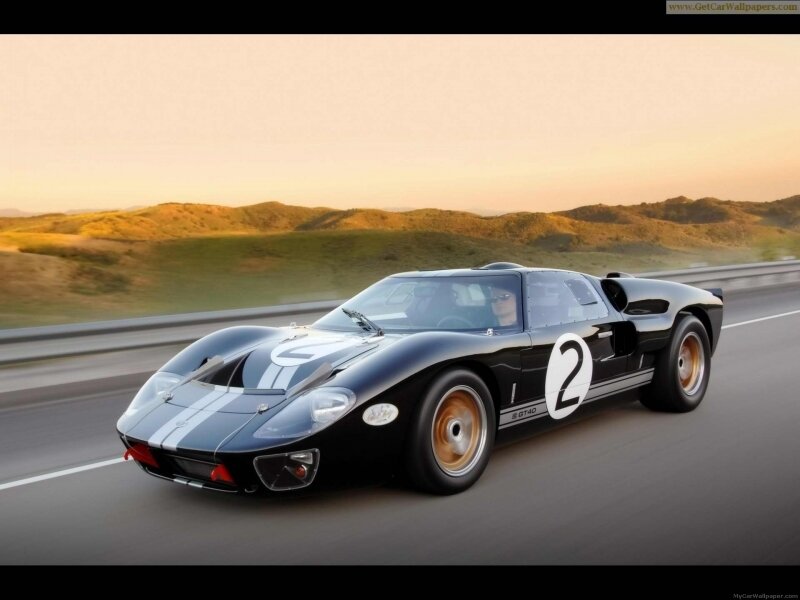 black race car on road