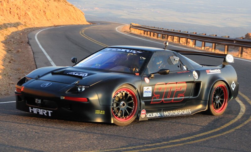 Black Race Car on Road — Dramatic