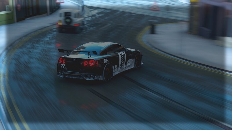 Black Race Car on Road — Dynamic, Night