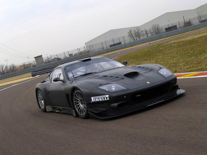 black race car on track