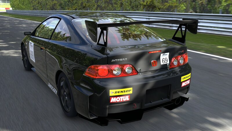 black race car on track