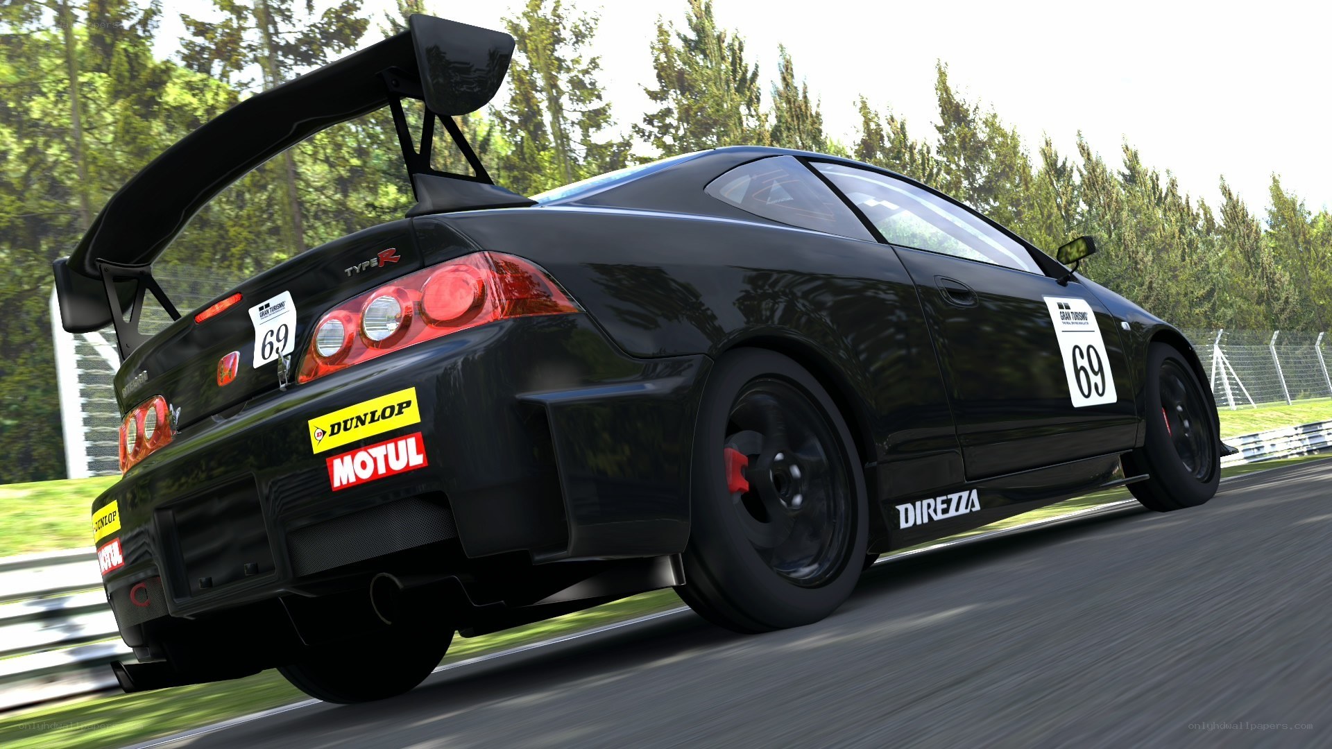 black race car on track