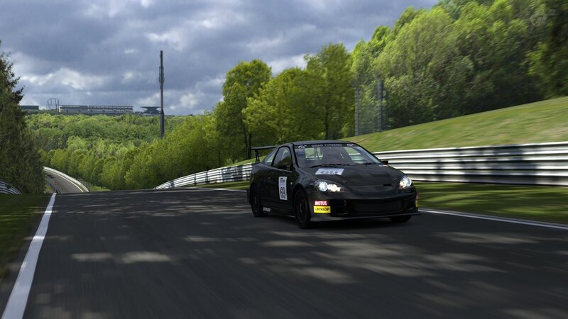 black race car on track