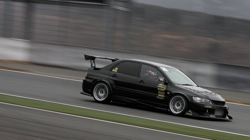 Black race car on track