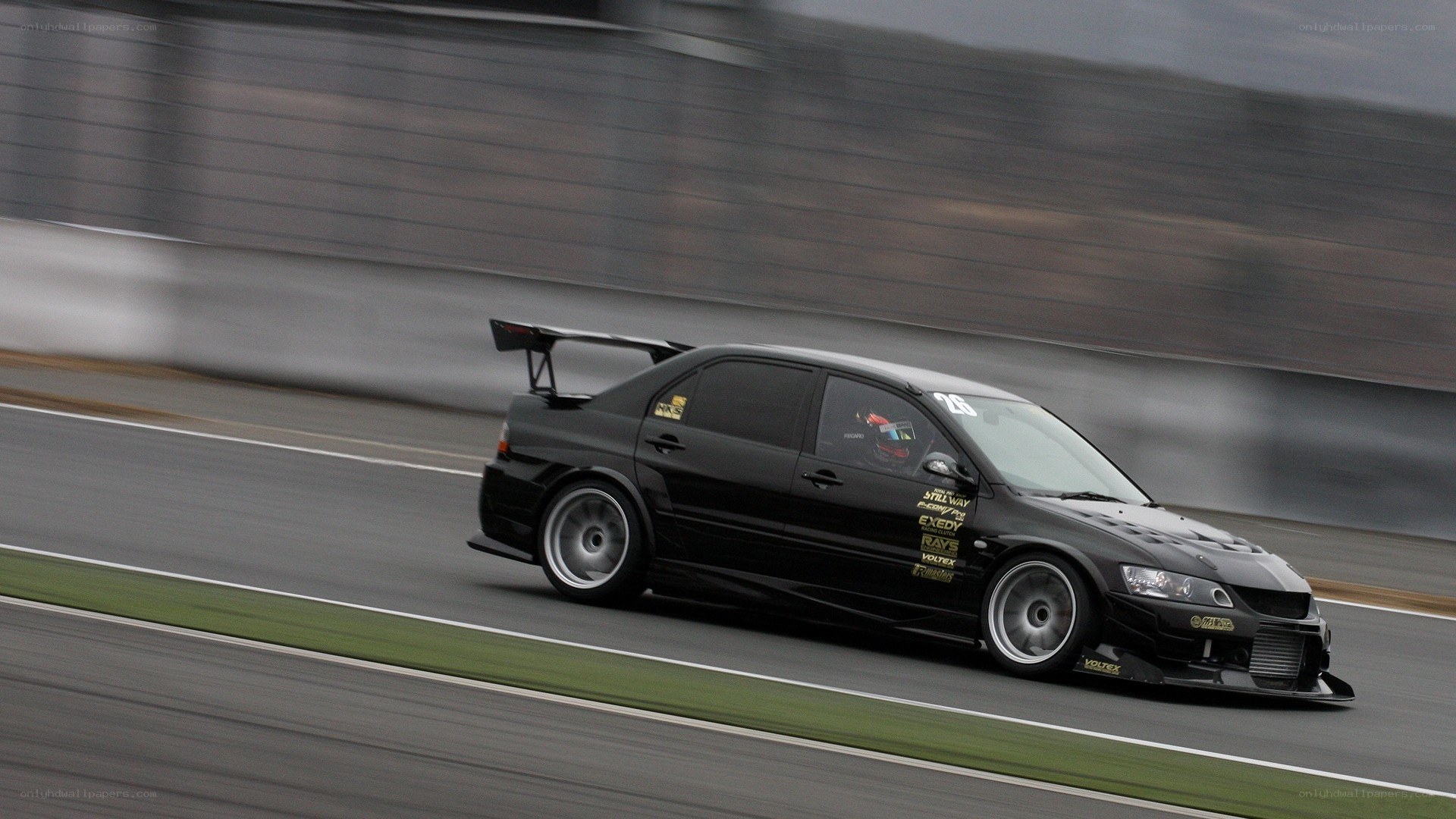 Black race car on track