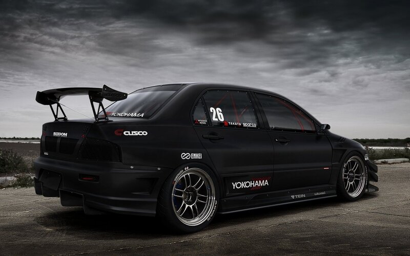 black race car on track