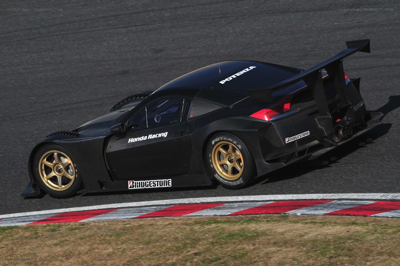 black race car on track