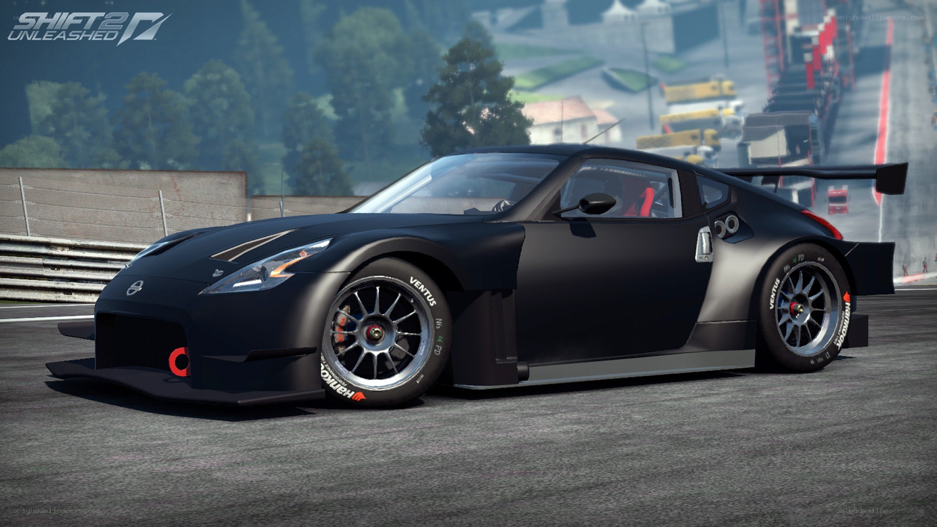 black race car on track