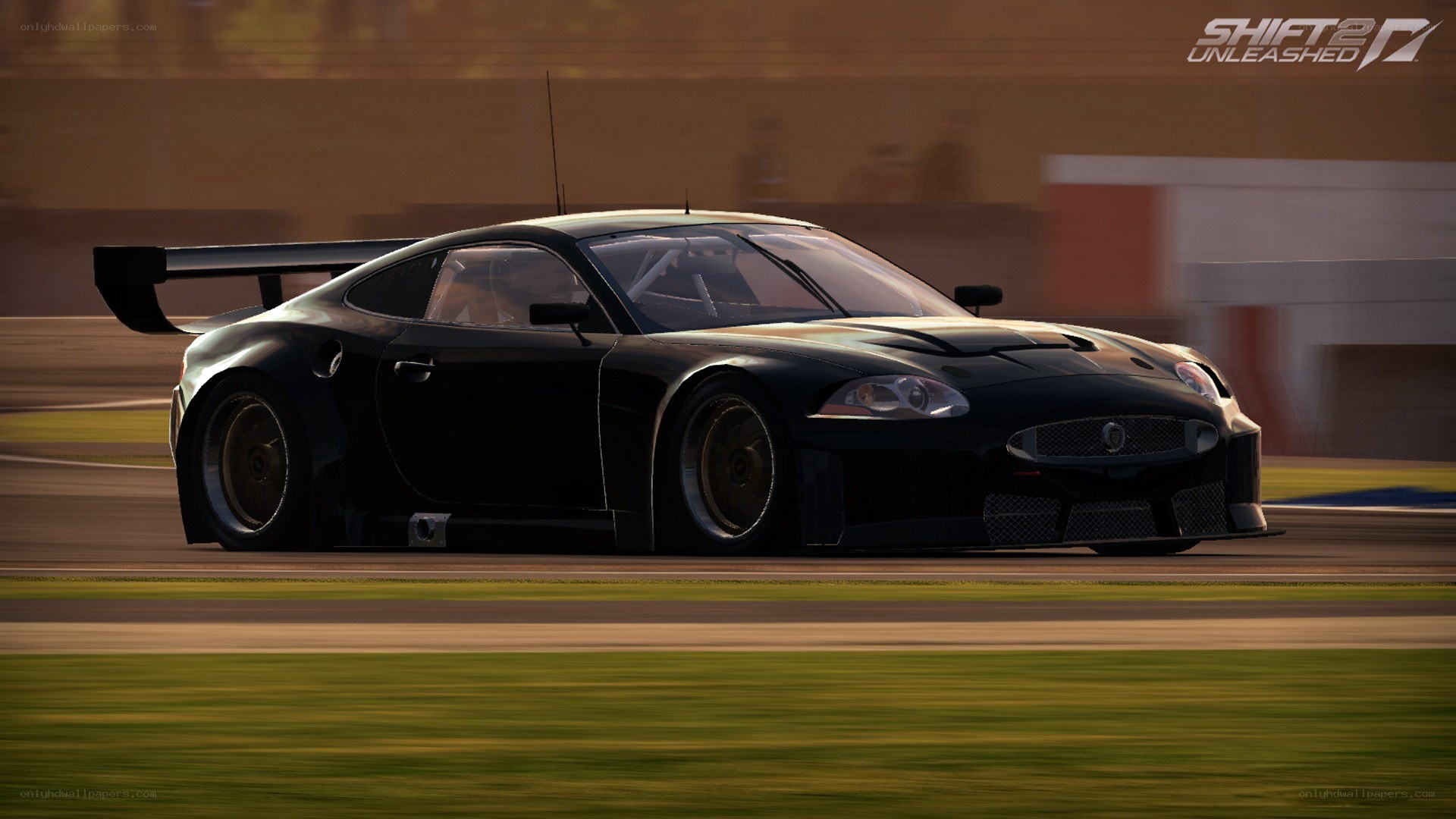 black race car on track