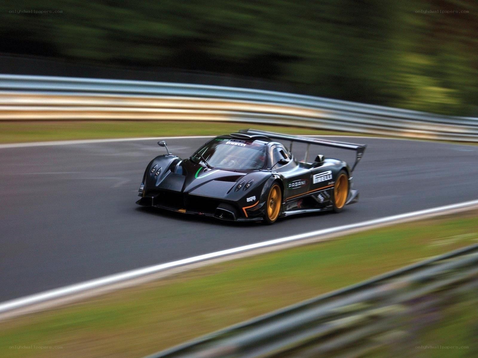 black race car on track