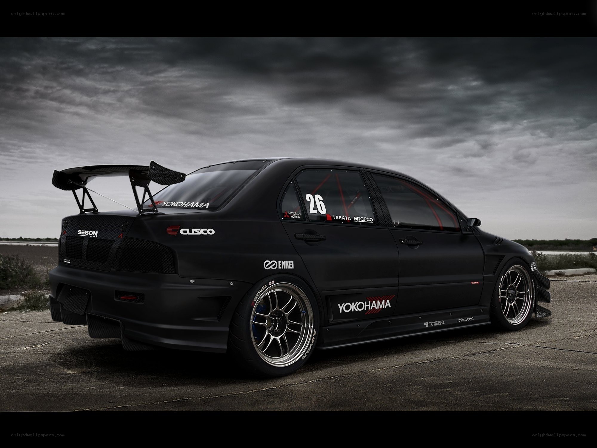 black race car on track