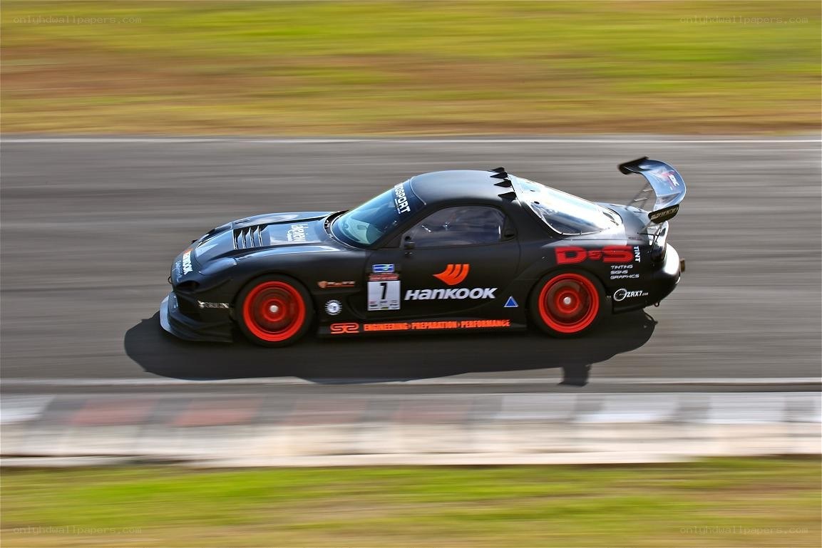 Black race car on track