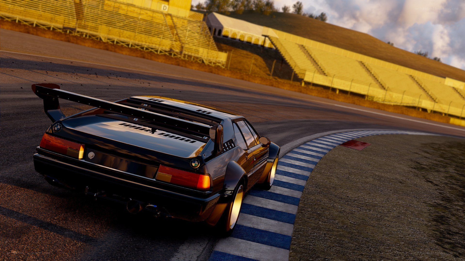 black race car on track
