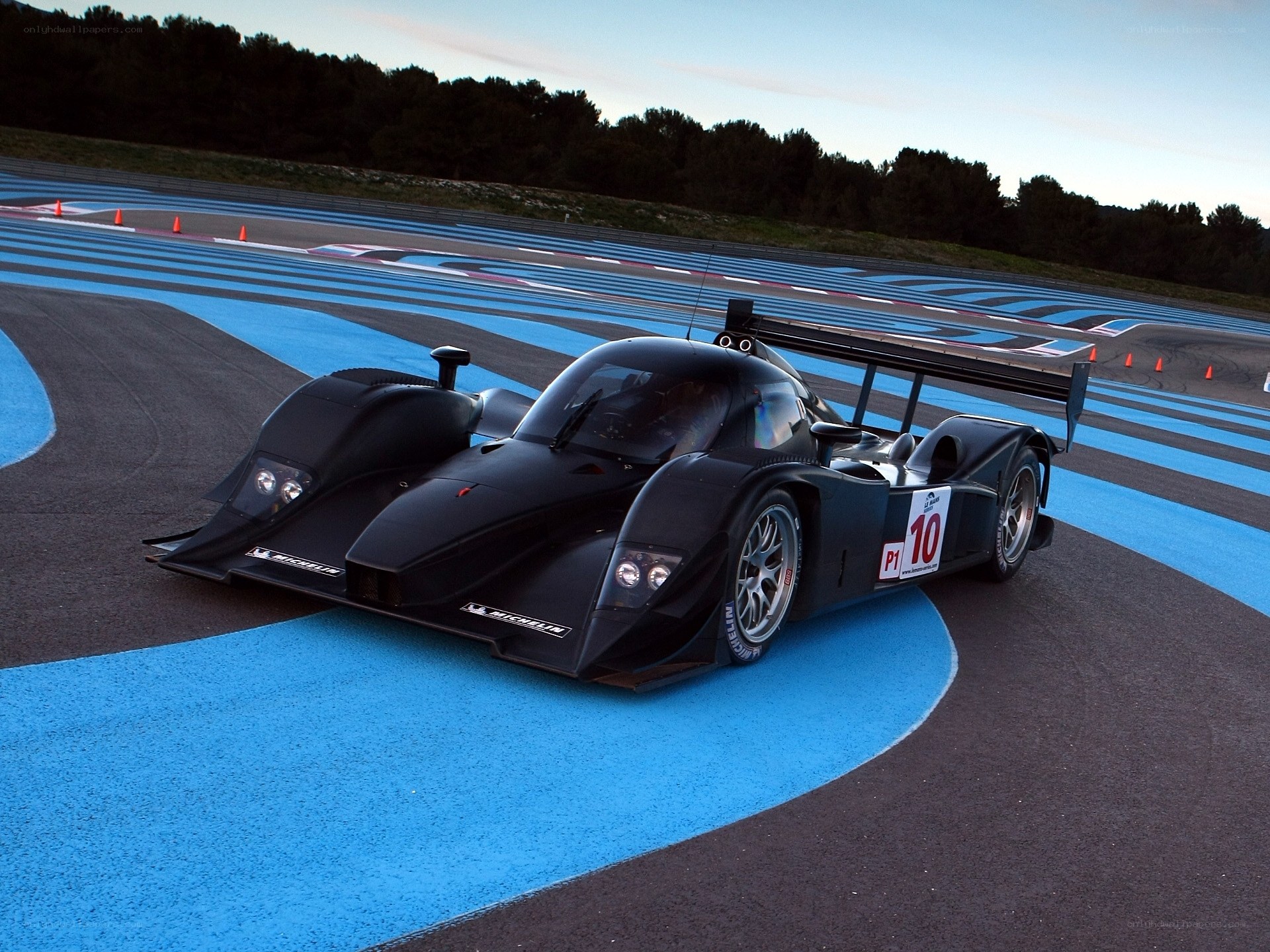 black race car on track