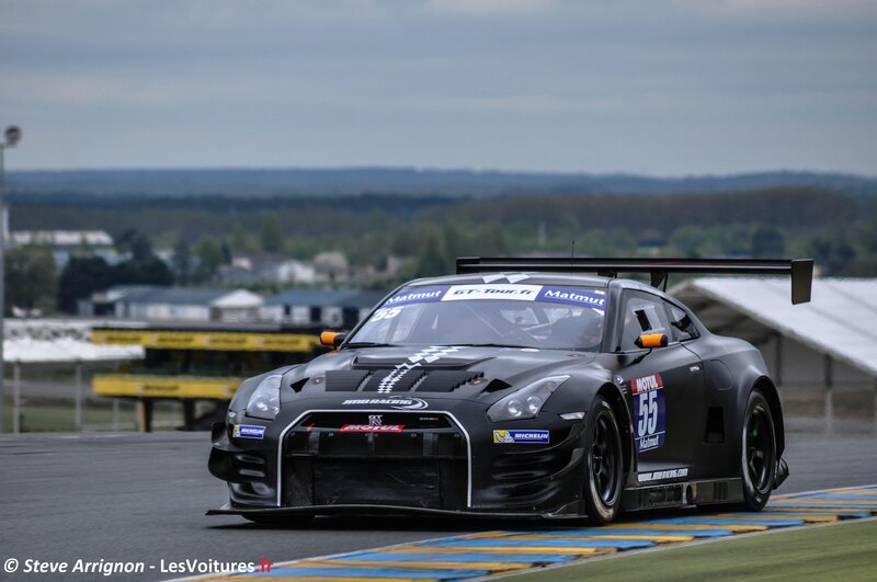 Black race car on track