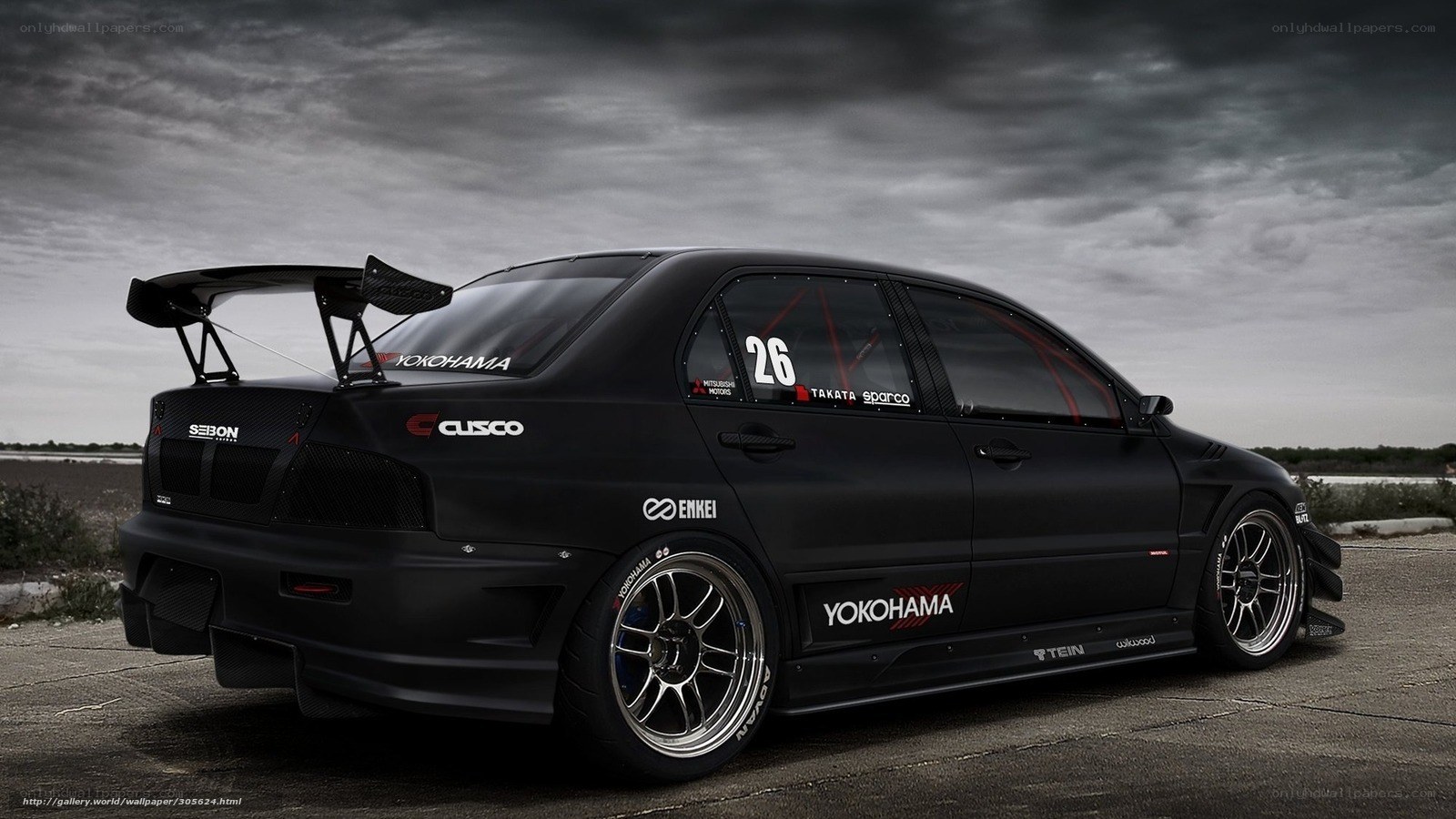 black race car on track