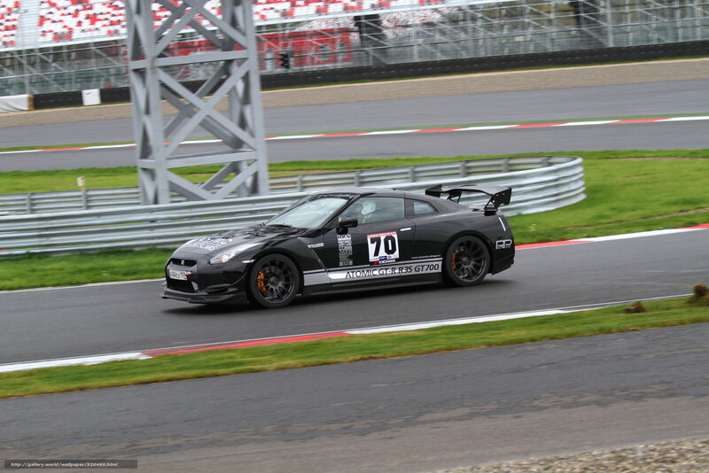 black race car on track
