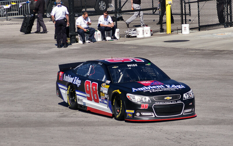 Black Race Car on Track — Active, Afternoon