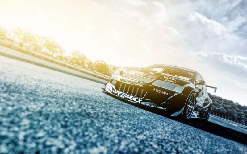 Black Race Car on Track — Blue