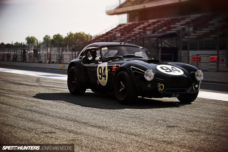 Black Race Car on Track — Dramatic, Afternoon, Photograph