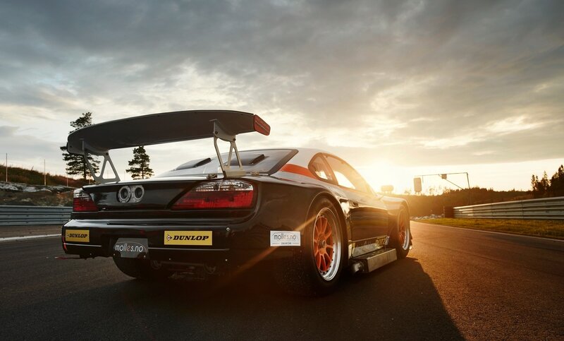 Black Race Car on Track — Dramatic, Sunset, Photograph, Race Track, Trees